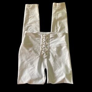 We wore what light gray leggings gold cross tie detail small